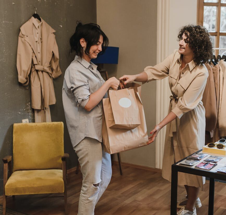 a woman shopping at a boutique
